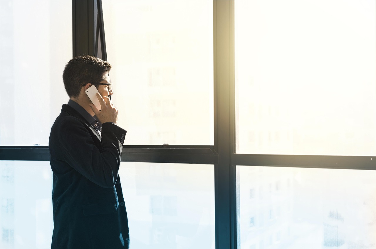 Man, cell phone, tuxedo — Nihar Gala: Setting New Standards in Business Innovation and Leadership