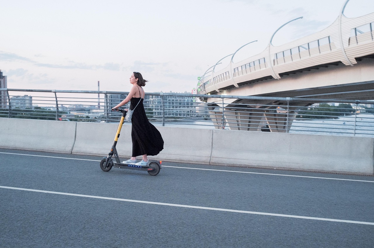 Woman, electric scooter, street — Wireless Bra: Soft and Flexible Fit for All-Day Ease